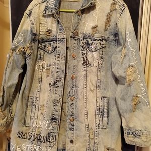 Distressed denim jacket